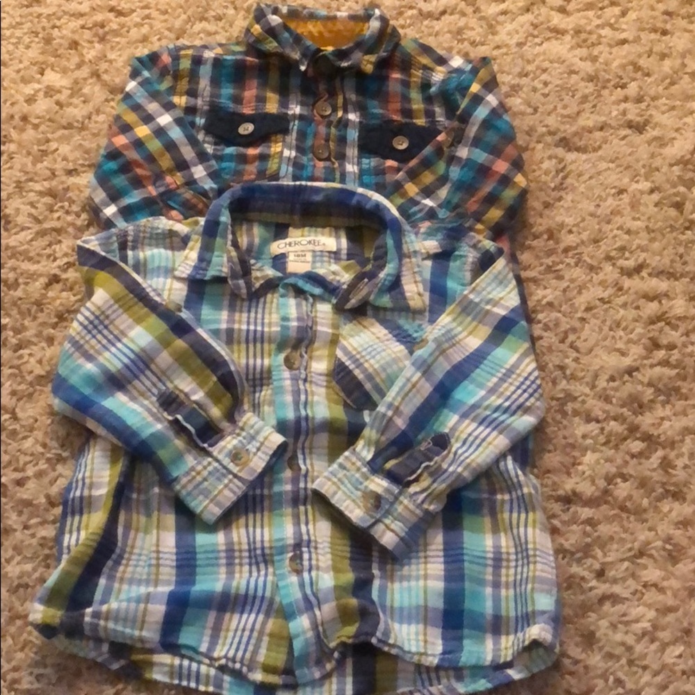 2 multi colored long sleeve shirts